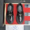 Prada Black Polished Leather Platform Loafers with Enamel Triangle Logo