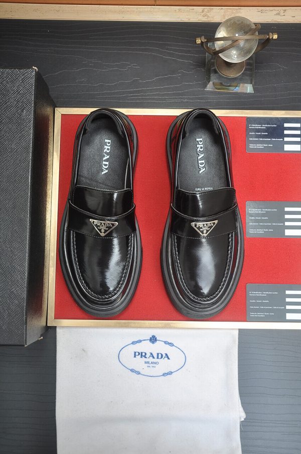 Prada Black Polished Leather Platform Loafers with Enamel Triangle Logo