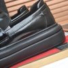 Prada Black Polished Leather Platform Loafers with Enamel Triangle Logo