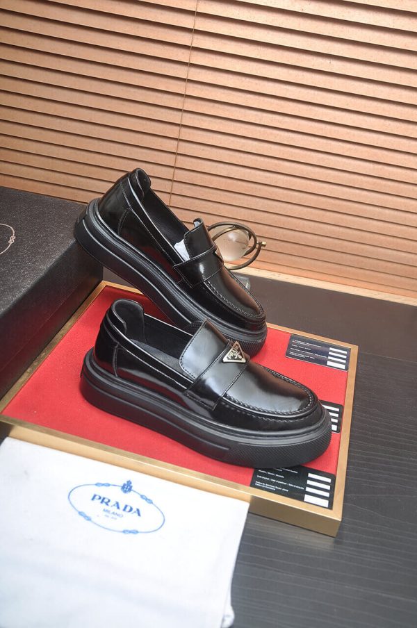 Prada Black Polished Leather Platform Loafers with Enamel Triangle Logo