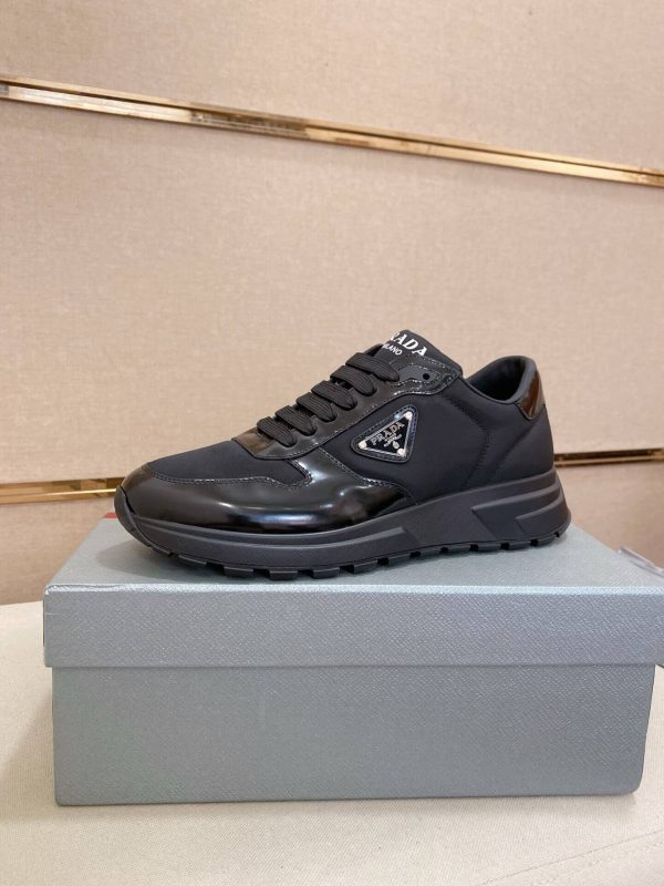 Prada Prax 01 Re-Nylon and Brushed Leather Sneakers in All Black