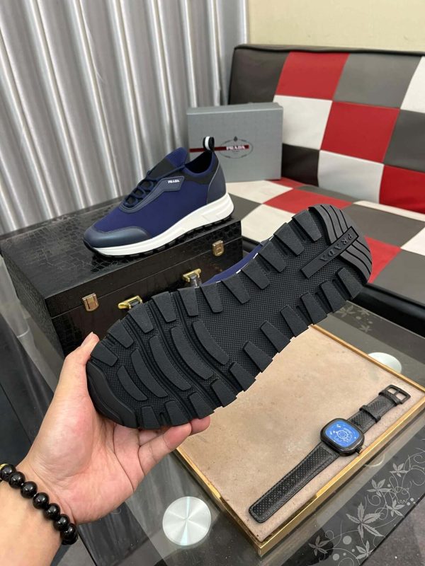 Pradamen_ssneakerinadarkbluecolor_withawhitesoleandblackaccents._3 Prada Linea Rossa Knit Sneaker in Blue