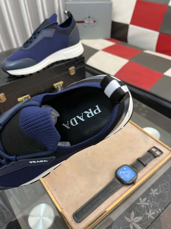 Pradamen_ssneakerinadarkbluecolor_withawhitesoleandblackaccents._4 Prada Linea Rossa Knit Sneaker in Blue