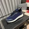 Pradamen_ssneakerinadarkbluecolor_withawhitesoleandblackaccents._5 (1) Prada Linea Rossa Knit Sneaker in Blue