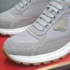 Prada Prax 2.0 Re-Nylon and Suede Sneaker in a gray colorway.