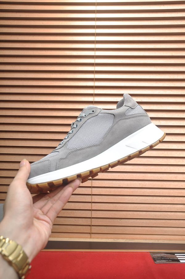 Prada Prax 2.0 Re-Nylon and Suede Sneaker in a gray colorway.