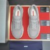 Prada Prax 2.0 Re-Nylon and Suede Sneaker in a gray colorway.