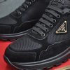 Black & Gold Prada Prax 2.0 Sneakers