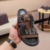ValentinoGaravaniDelroyLeatherSlip-OnSandalinbrownleatherwithblackaccents._4 Valentino Garavani VLTN Leather Sandals in Brown