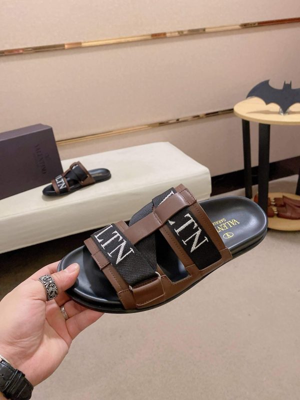 ValentinoGaravaniDelroyLeatherSlip-OnSandalinbrownleatherwithblackaccents._7 Valentino Garavani VLTN Leather Sandals in Brown