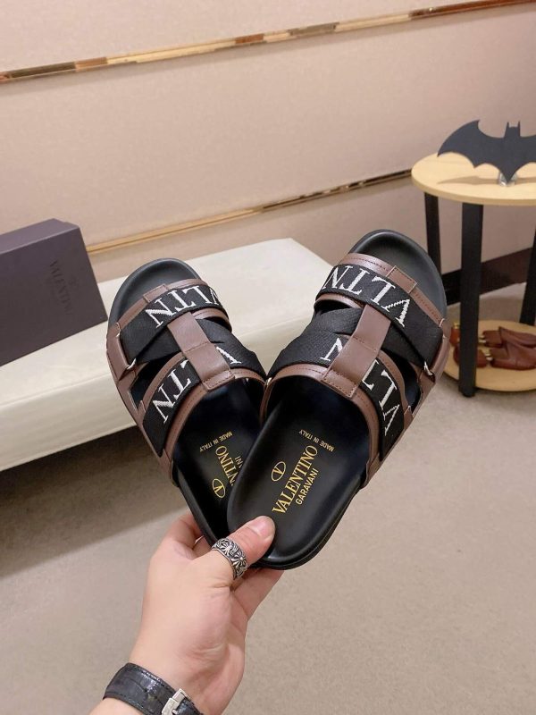 ValentinoGaravaniDelroyLeatherSlip-OnSandalinbrownleatherwithblackaccents._8 Valentino Garavani VLTN Leather Sandals in Brown