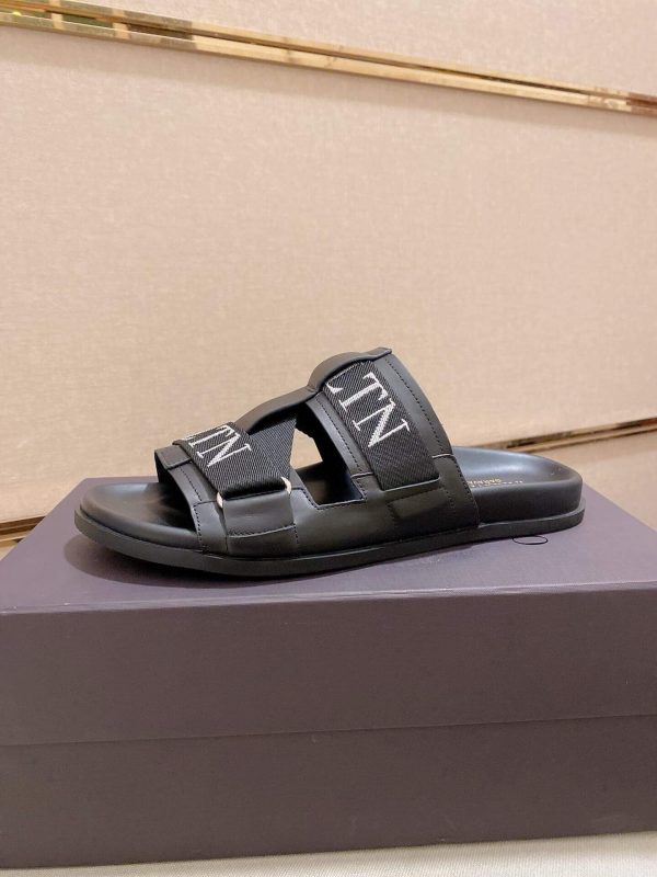 Valentino Garavani VLTN Leather Sandals in Black