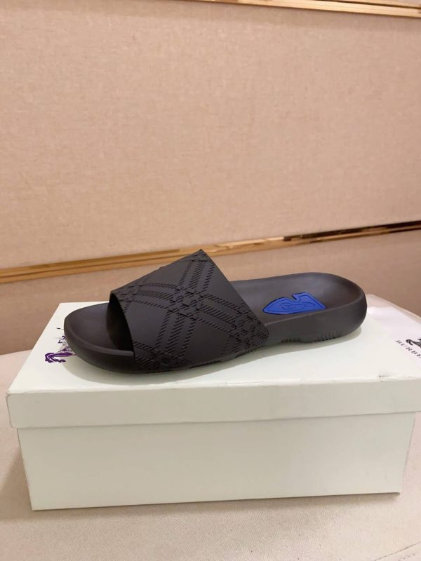 Burberry Embossed Check Dive Slides in Black