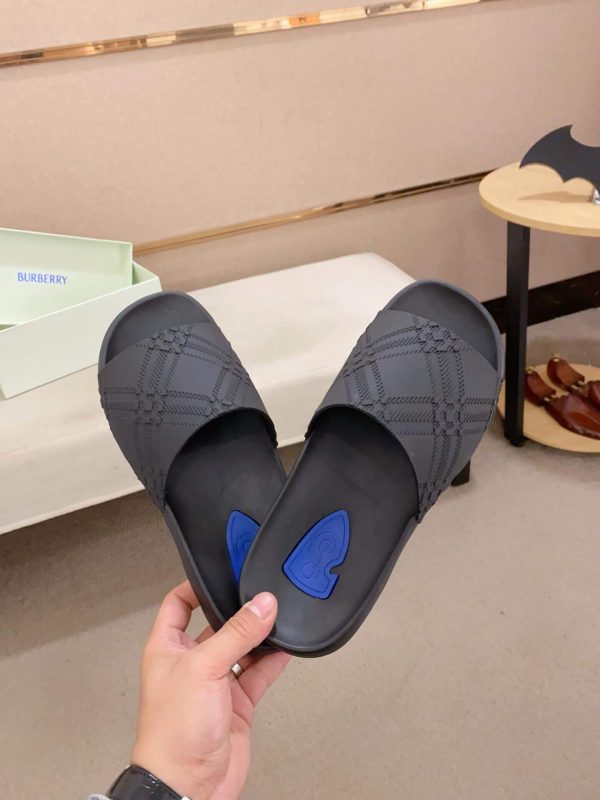 Burberry Embossed Check Dive Slides in Black