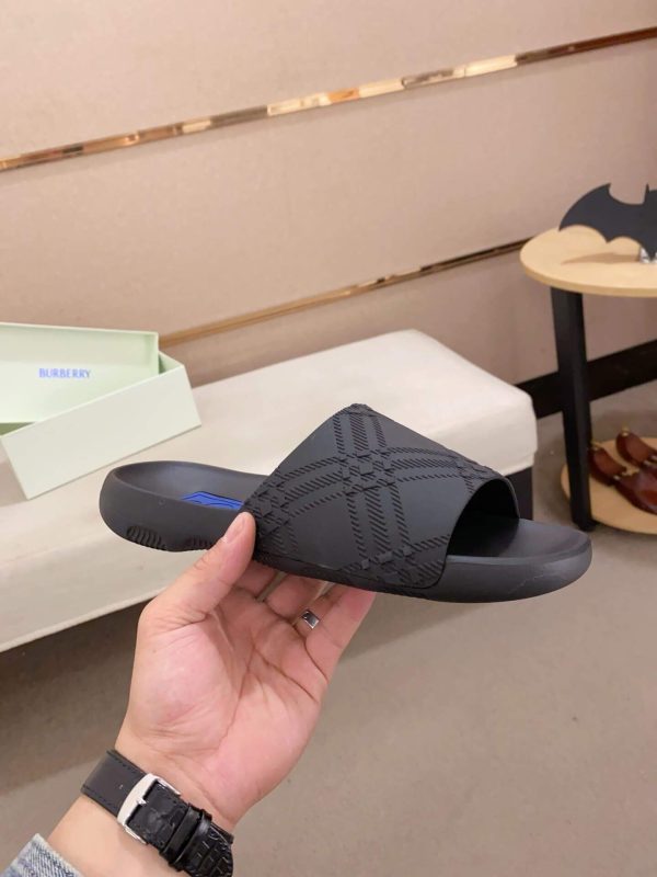 Burberry Embossed Check Dive Slides in Black