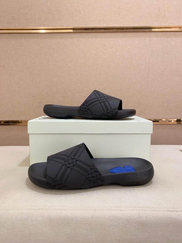 Burberry Embossed Check Dive Slides in Black