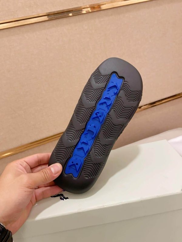 Burberry Embossed Check Dive Slides in Black