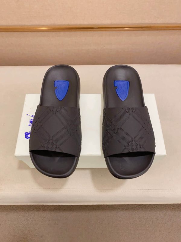 Burberry Embossed Check Dive Slides in Black