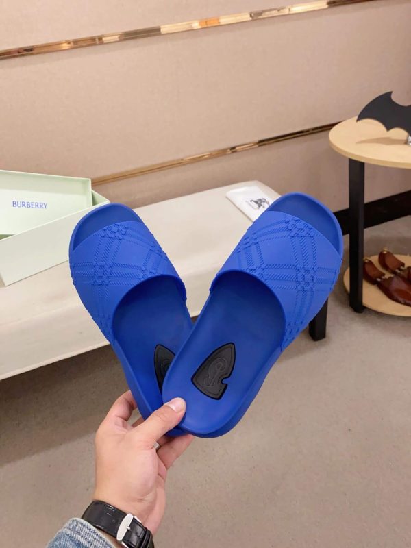 Burberry Embossed Check Dive Slides in Blue