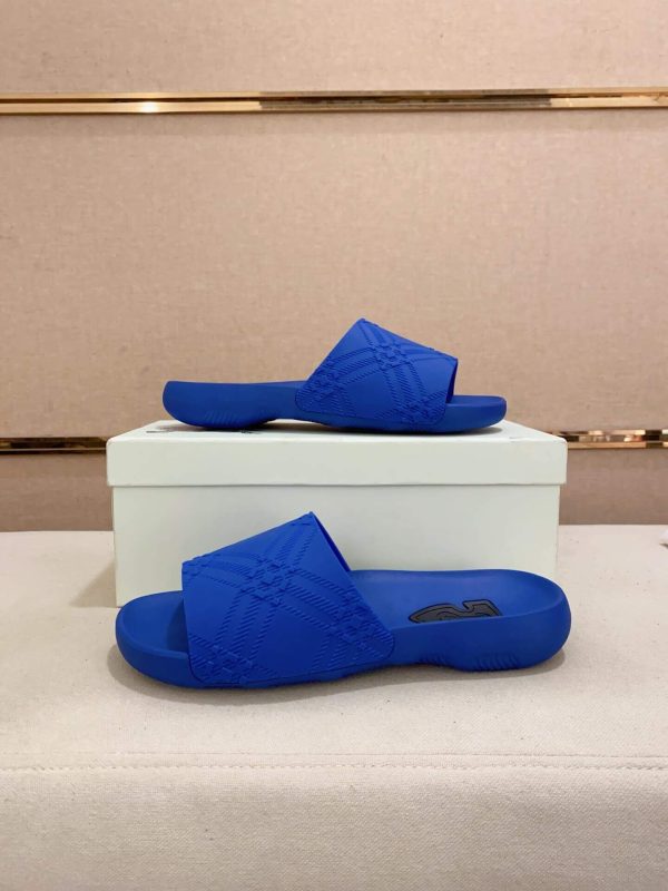 Burberry Embossed Check Dive Slides in Blue