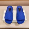 Burberry Embossed Check Dive Slides in Blue