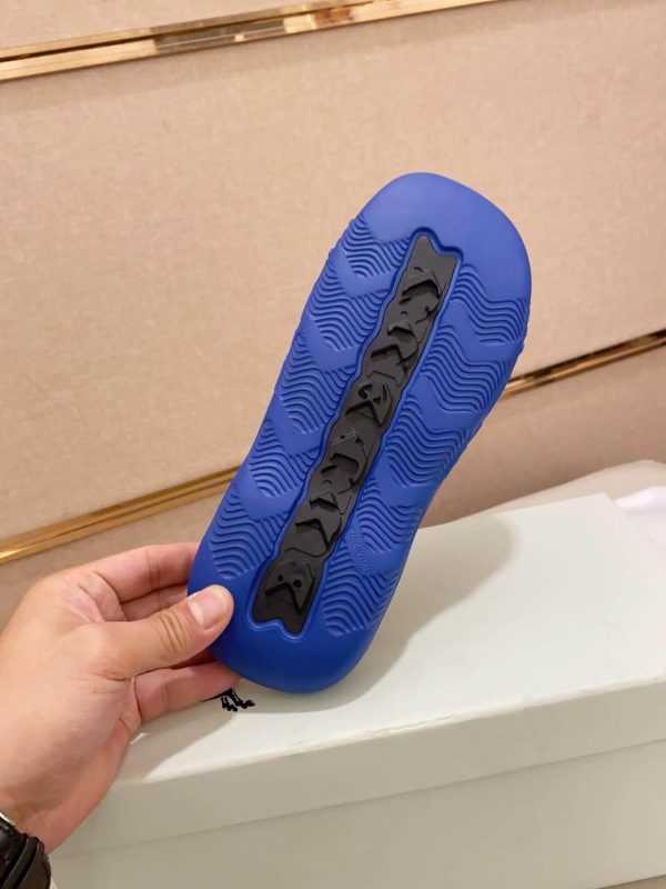 Burberry Embossed Check Dive Slides in Blue