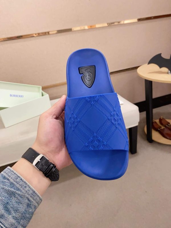 Burberry Embossed Check Dive Slides in Blue