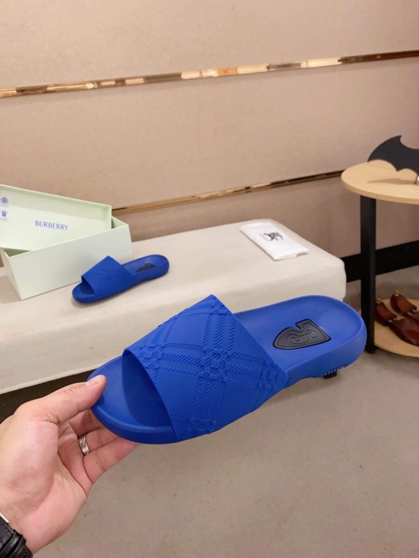 Burberry Embossed Check Dive Slides in Blue