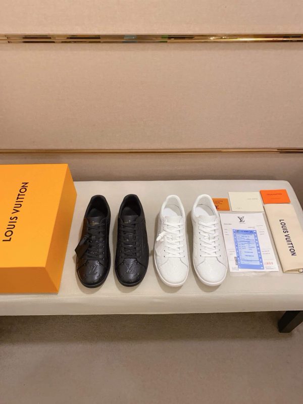 LOUIS VUITTON Luxembourg Sneaker in Black Monogram Embossed Leather