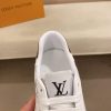 whiteLouisVuittonRivolisneakerwithagraymonogrampattern._1 LV White Monogram Canvas and White Leather Sneakers