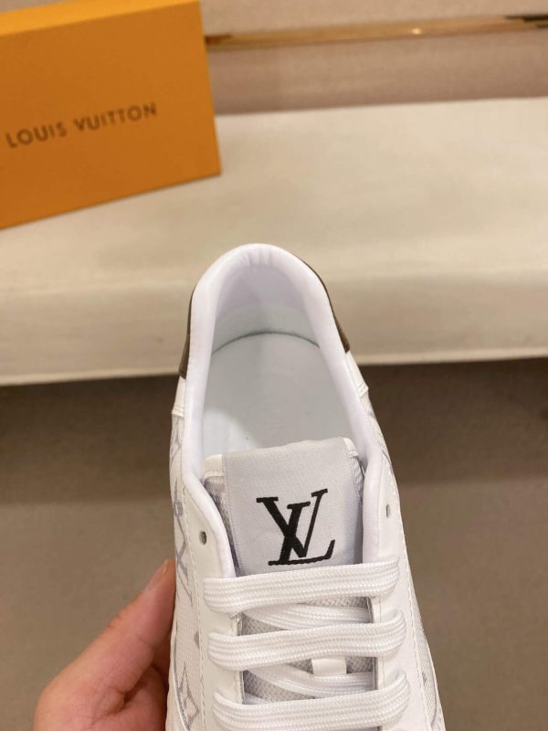whiteLouisVuittonRivolisneakerwithagraymonogrampattern._1 LV White Monogram Canvas and White Leather Sneakers