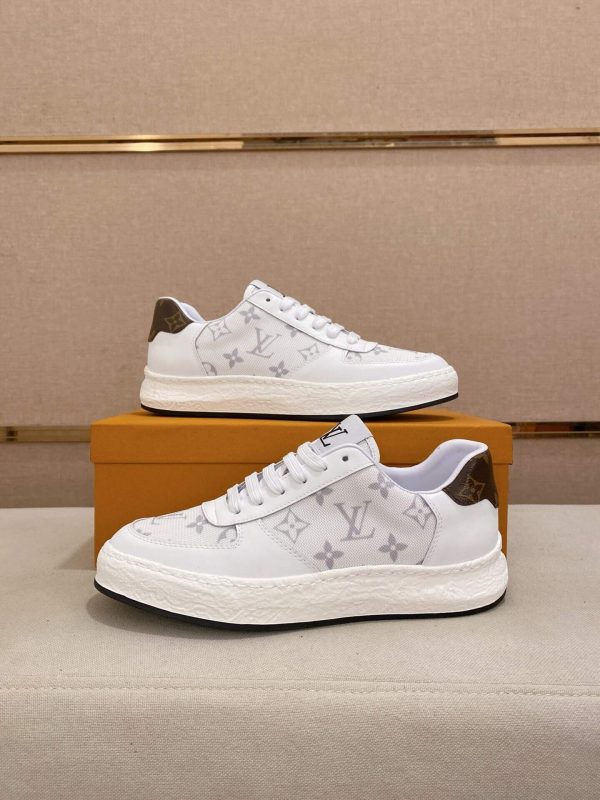 whiteLouisVuittonRivolisneakerwithagraymonogrampattern._2 LV White Monogram Canvas and White Leather Sneakers