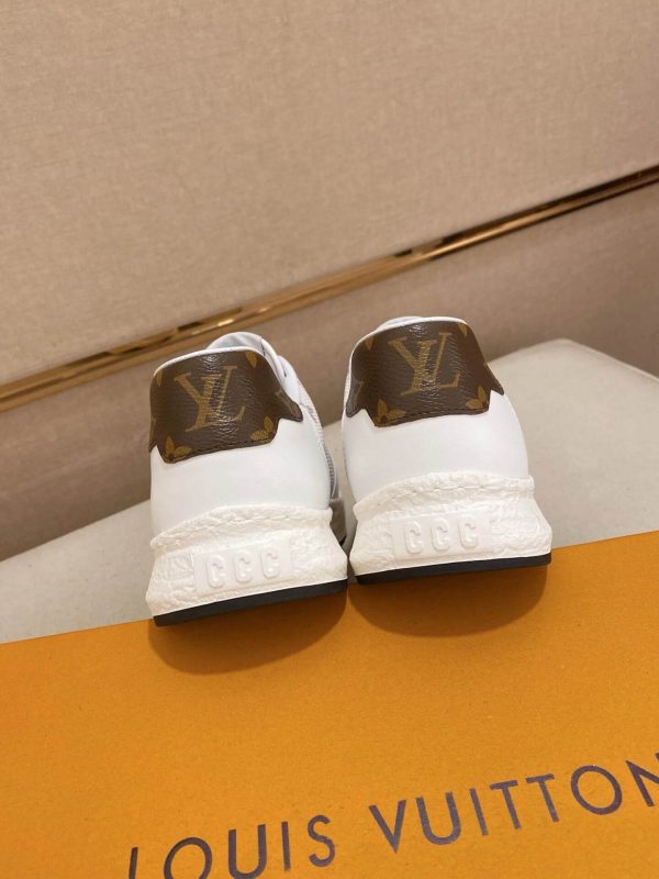 whiteLouisVuittonRivolisneakerwithagraymonogrampattern._3 LV White Monogram Canvas and White Leather Sneakers