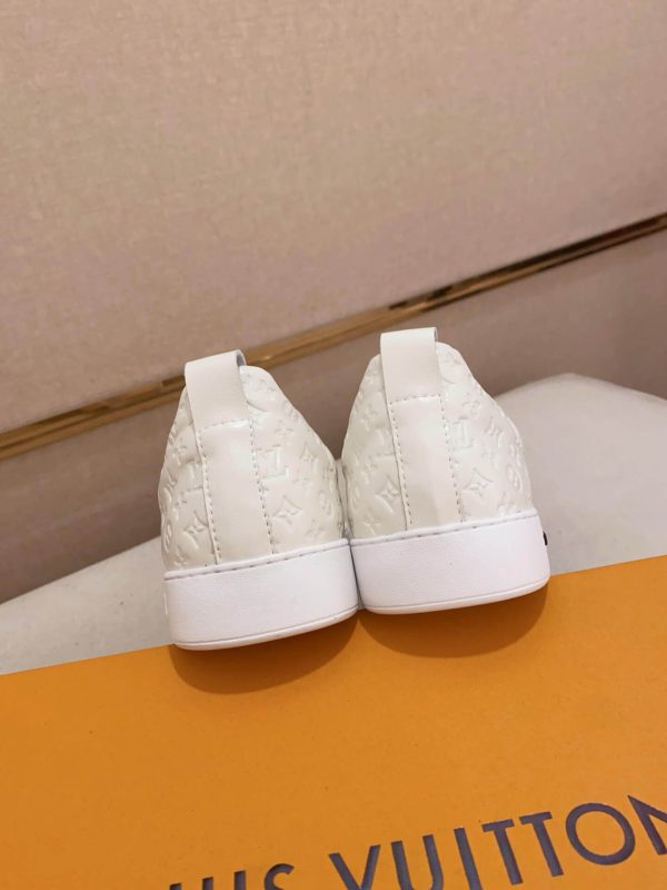 whiteLouisVuittonslip-onsneakerswiththebrand_smonogrampatternembossedontheupper._1 LV Slip-On Sneakers in White Monogram Embossed Leather