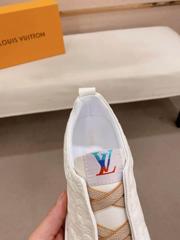 whiteLouisVuittonslip-onsneakerswiththebrand_smonogrampatternembossedontheupper._2 LV Slip-On Sneakers in White Monogram Embossed Leather