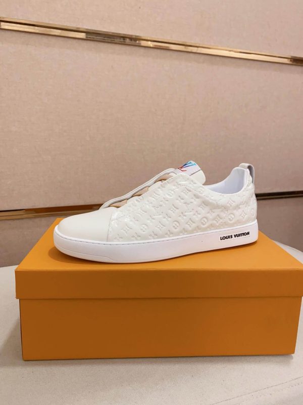 whiteLouisVuittonslip-onsneakerswiththebrand_smonogrampatternembossedontheupper._5 LV Slip-On Sneakers in White Monogram Embossed Leather