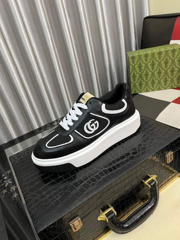 Gucci- GG -Chunky -Men's -Black -And- White- Low- Top -Sneakers. (1) Gucci GG Chunky Men's Black And White Low Top Sneakers.