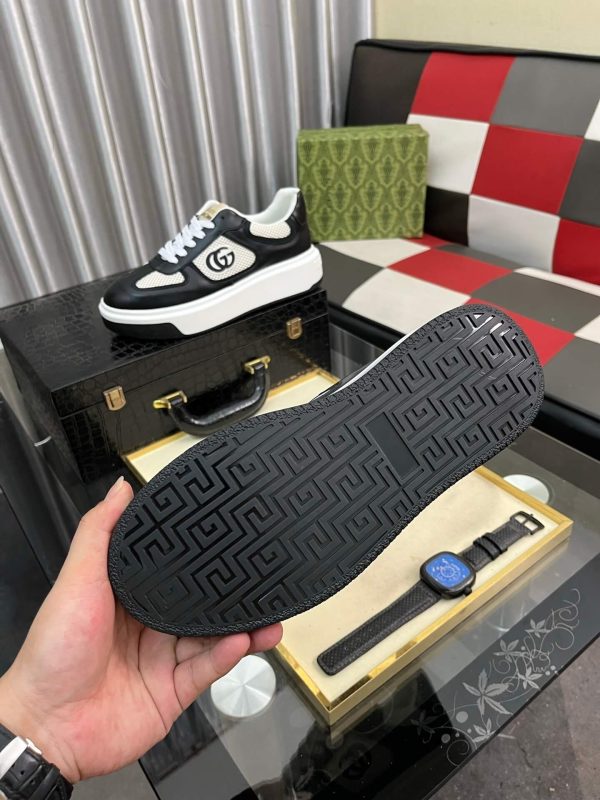 Gucci -GG -Chunky -Men's -Black -And --White- Low- Top -Sneakers. (1) Gucci GG Chunky Men's Black And White Low Top Sneakers.