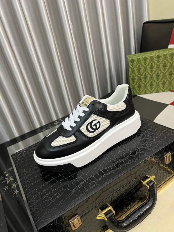 Gucci -GG -Chunky -Men's -Black -And --White- Low- Top -Sneakers. (2) Gucci GG Chunky Men's Black And White Low Top Sneakers.