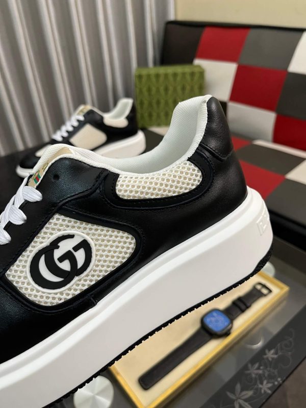 Gucci -GG -Chunky -Men's -Black -And --White- Low- Top -Sneakers. (7) Gucci GG Chunky Men's Black And White Low Top Sneakers.