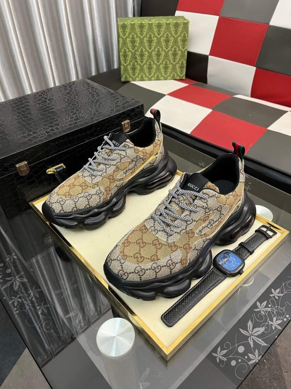 Gucci GG Rhyton sneakers.