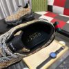 Gucci GG Rhyton sneakers.