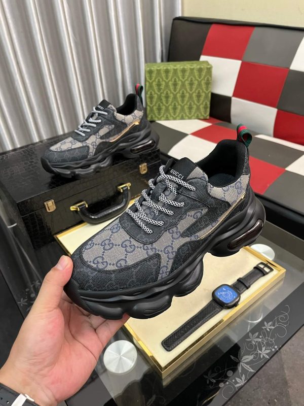 Gucci GG Rhyton sneakers.