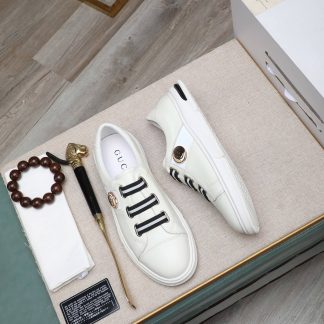 Gucci Ace Logo Strap Sneakers.