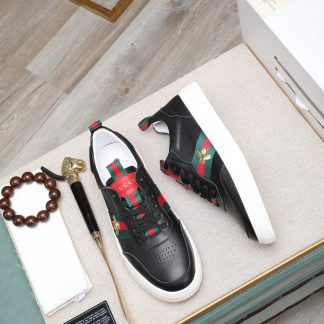 Gucci Ace Logo Strap Sneakers.