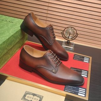 Gucci brown leather Oxford shoes.