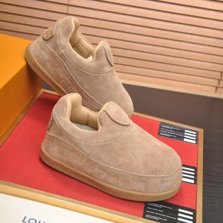 Louis Vuitton LV Yeti Slip-On in beige suede calf leather.