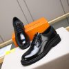 Louis Vuitton black leather lace-up derby shoes.