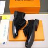 Louis Vuitton black leather lace-up derby shoes.