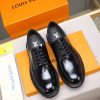 Louis Vuitton black leather lace-up derby shoes.